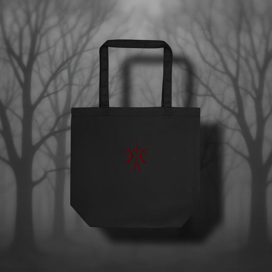 Schwarze Bio-Tote Bag mit dunkelrotem gesticktem Cultural Carnage Apparel Logo und langen Trägern – robuste Stofftasche im Gothic Streetwear Stil