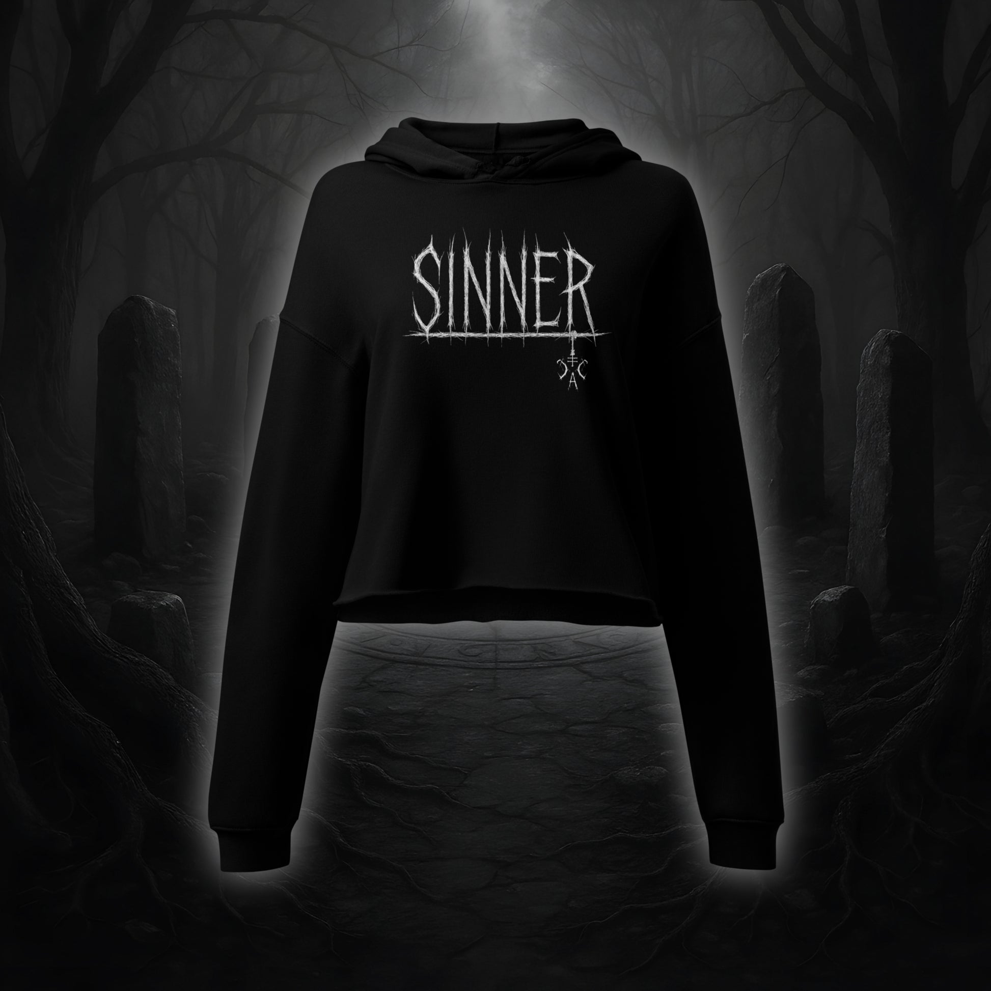 Schwarzer Crop Hoodie mit weißem Cultural Carnage Statement „SINNER“ im Attitude-Design