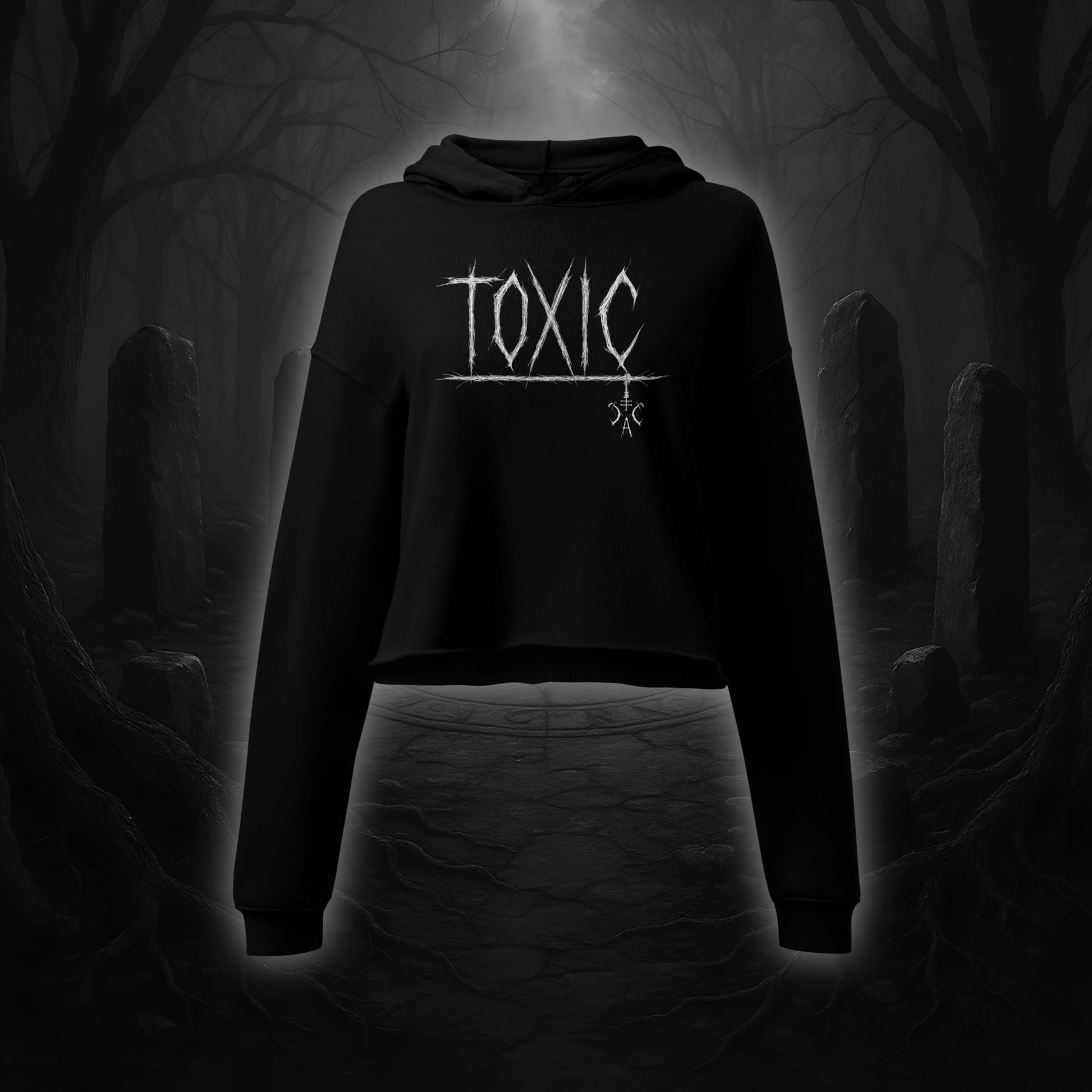 Schwarzer Crop Hoodie mit weißem Cultural Carnage Statement „TOXIC“ im Attitude-Design